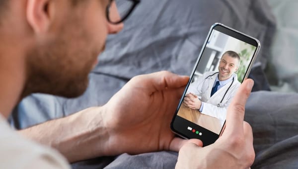 Person having a virtual doctor consultation on their phone
